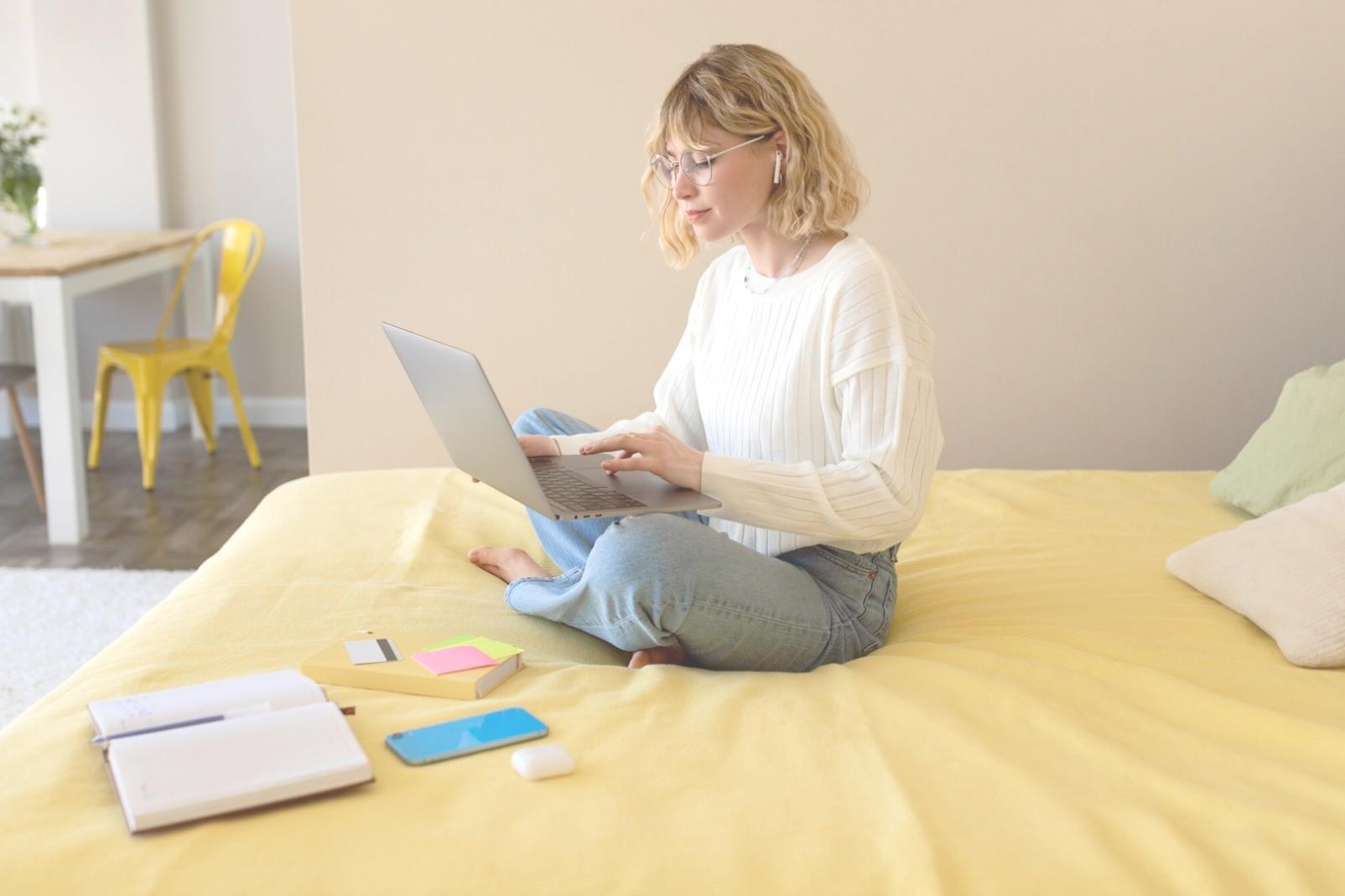 Family reviewing household budget categories on laptop