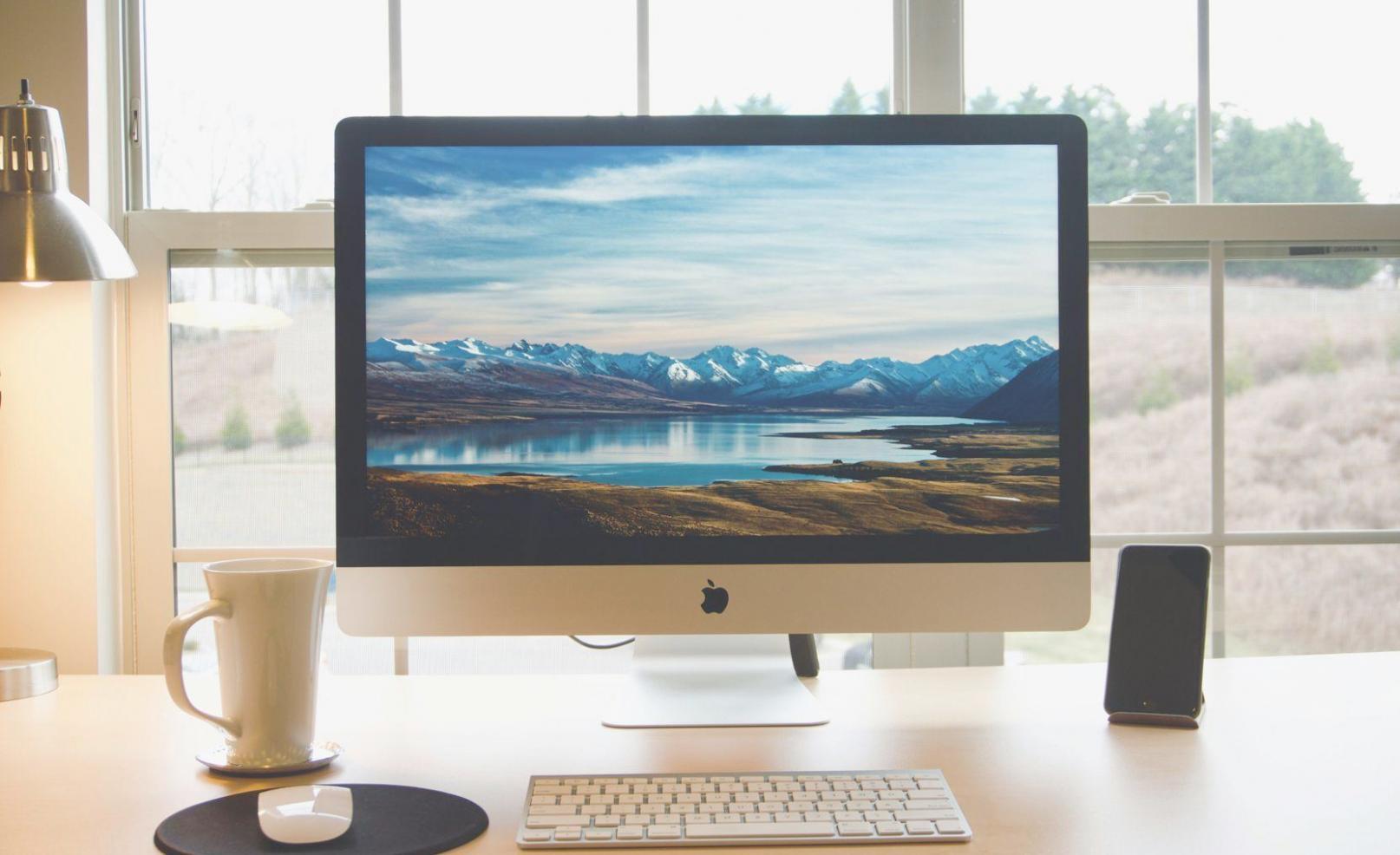 Professional financial planning workspace with organized documents and calculator